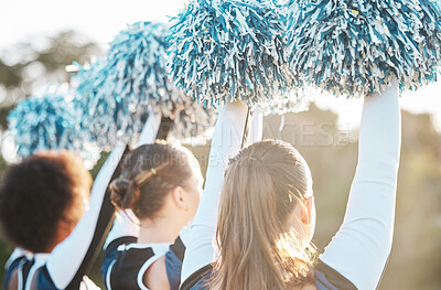 Buy stock photo Cheerleader, sports and women with hands raised on field for performance, dance and game motivation. Teamwork, dancer and people in costume cheer for support in match, competition and event outdoors