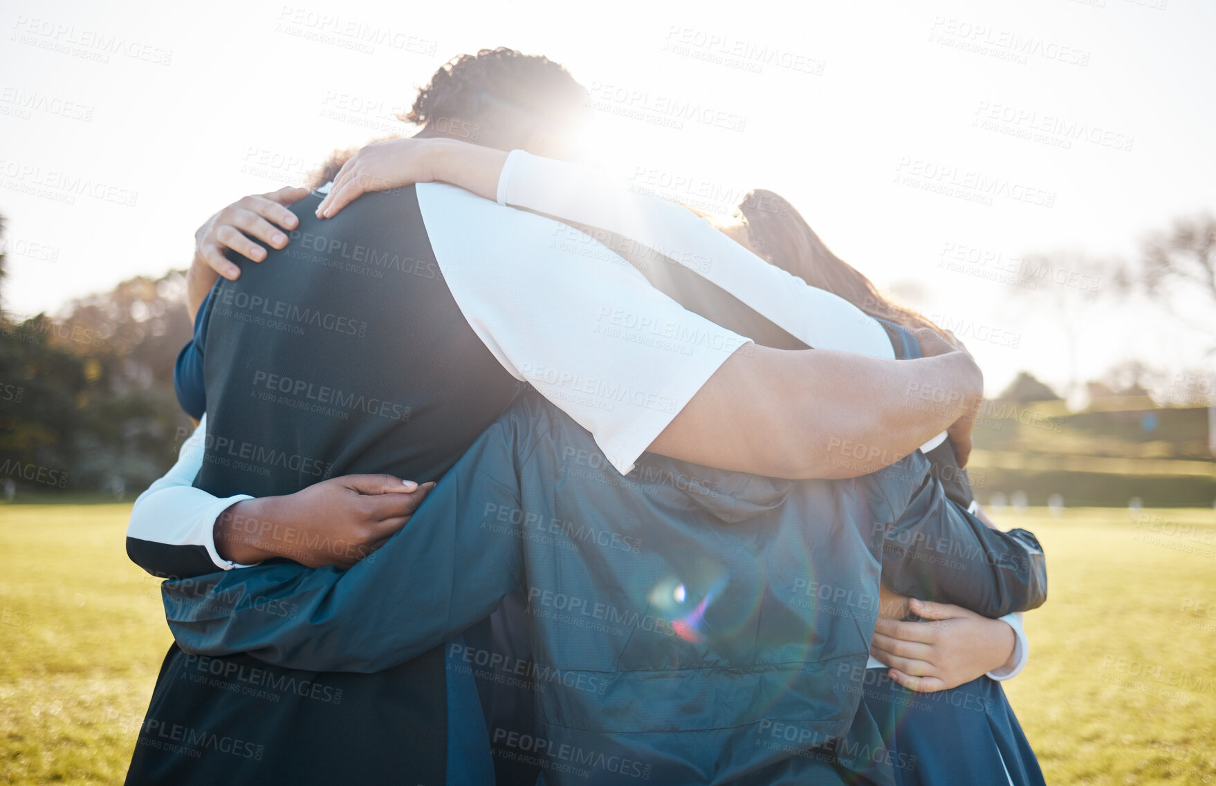 Buy stock photo Cheerleader team, group hug and huddle for sports competition support, trust or community motivation. Cheerleading, group solidarity and dancer care embrace, teamwork or contest unity on grass pitch