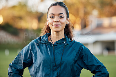 Coach, sports and portrait of woman on field with confidence for training, planning and game strategy. Happy, pride and personal trainer outdoors for exercise, workout schedule and fitness routine