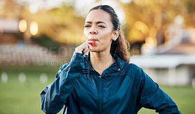 Coach, sports and woman blowing whistle on field for training, planning and challenge for games. Coaching, manager and personal trainer outdoors for exercise, workout schedule and fitness routine