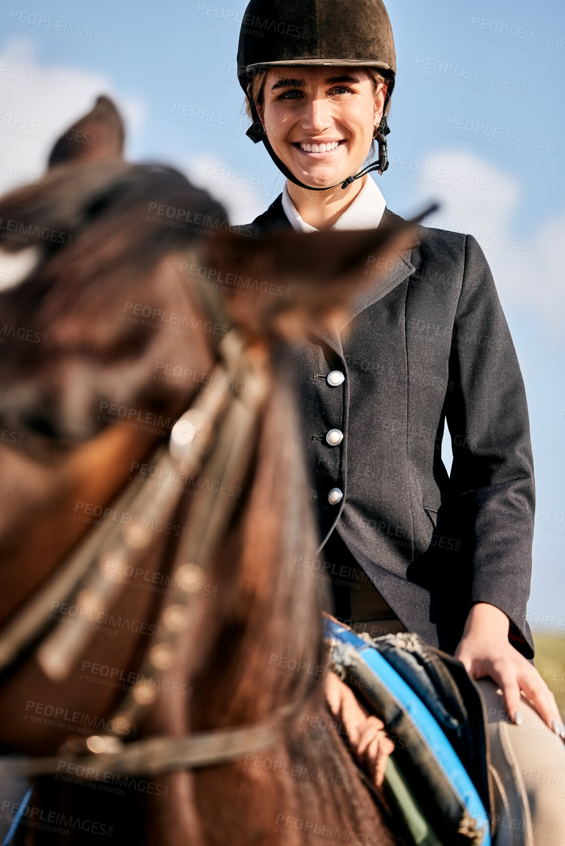 Buy stock photo Portrait, equestrian and a woman with an animal on a ranch for sports, training or a leisure hobby. Horse riding, smile or competition and a happy young rider in uniform with her stallion outdoor