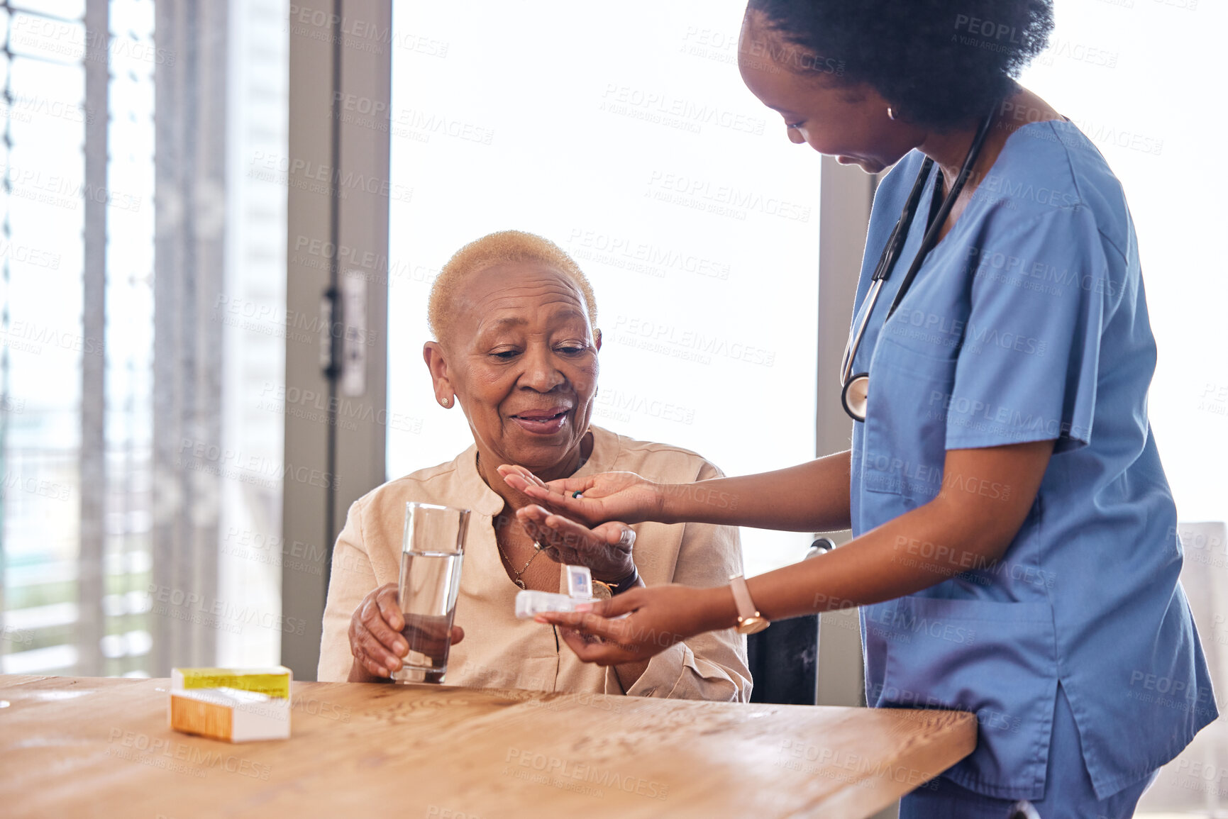 Buy stock photo Nurse giving old woman pills in home with water for healthcare, wellness and help. Caregiver, medicine and African patient with glass to drink medical drugs, vitamins and supplements in retirement