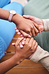 People, hand and holding for assistance in closeup with support, mobility or kindness in nursing home. Diverse group, person and care for patient at appointment with hospital, illness or diagnosis