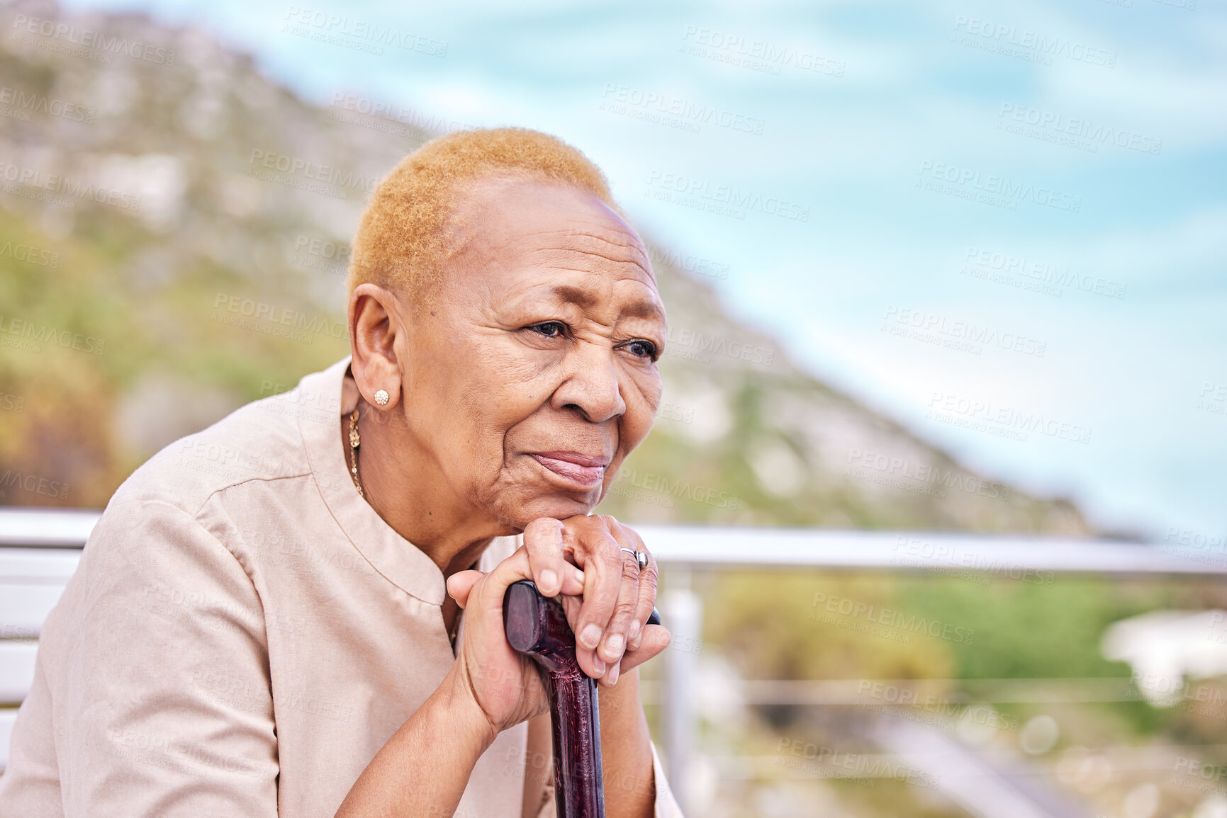 Buy stock photo Depression, walking stick and a sad elderly woman on a park bench with nostalgia in nature during summer. Face, summer and a senior person with a disability looking lonely while in the mountains