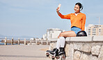 Roller skating, woman and selfie on beach for profile picture, internet post and social media outdoor in nature. Sports, person and headphones by ocean or sea for relax, freedom and happiness online