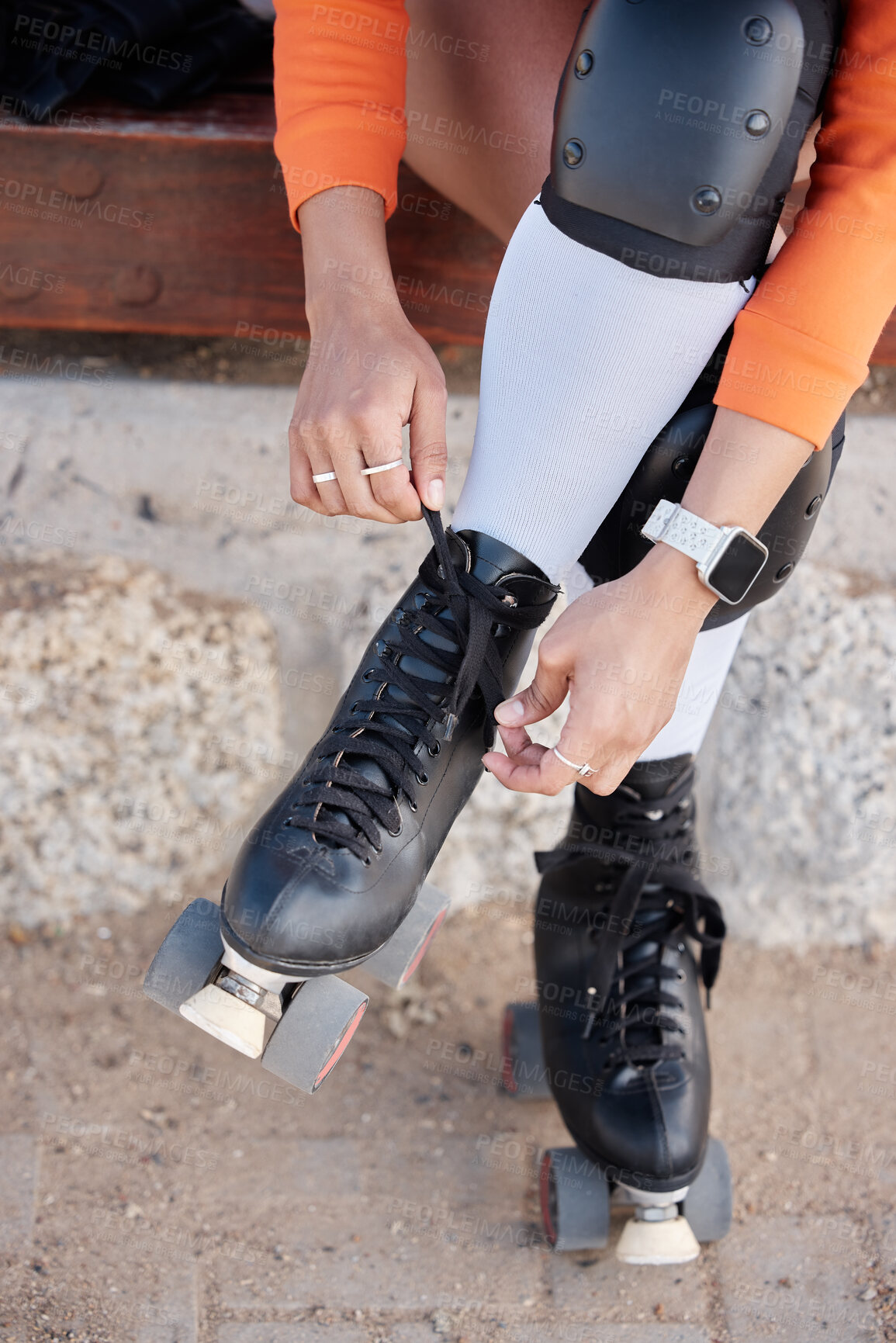 Buy stock photo Roller skate, shoes and hands of woman outdoor with exercise, workout or training with wheels on sidewalk or ground. Fun, sport and start fitness with cardio, rollerskating and safety gear in summer