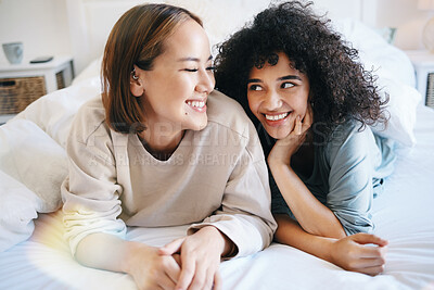 Buy stock photo Lesbian, couple and bedroom for connection or happiness talking, communication or lgbtq. Gay women, connection together and unique queer identity love in apartment, relax or pride in home for morning
