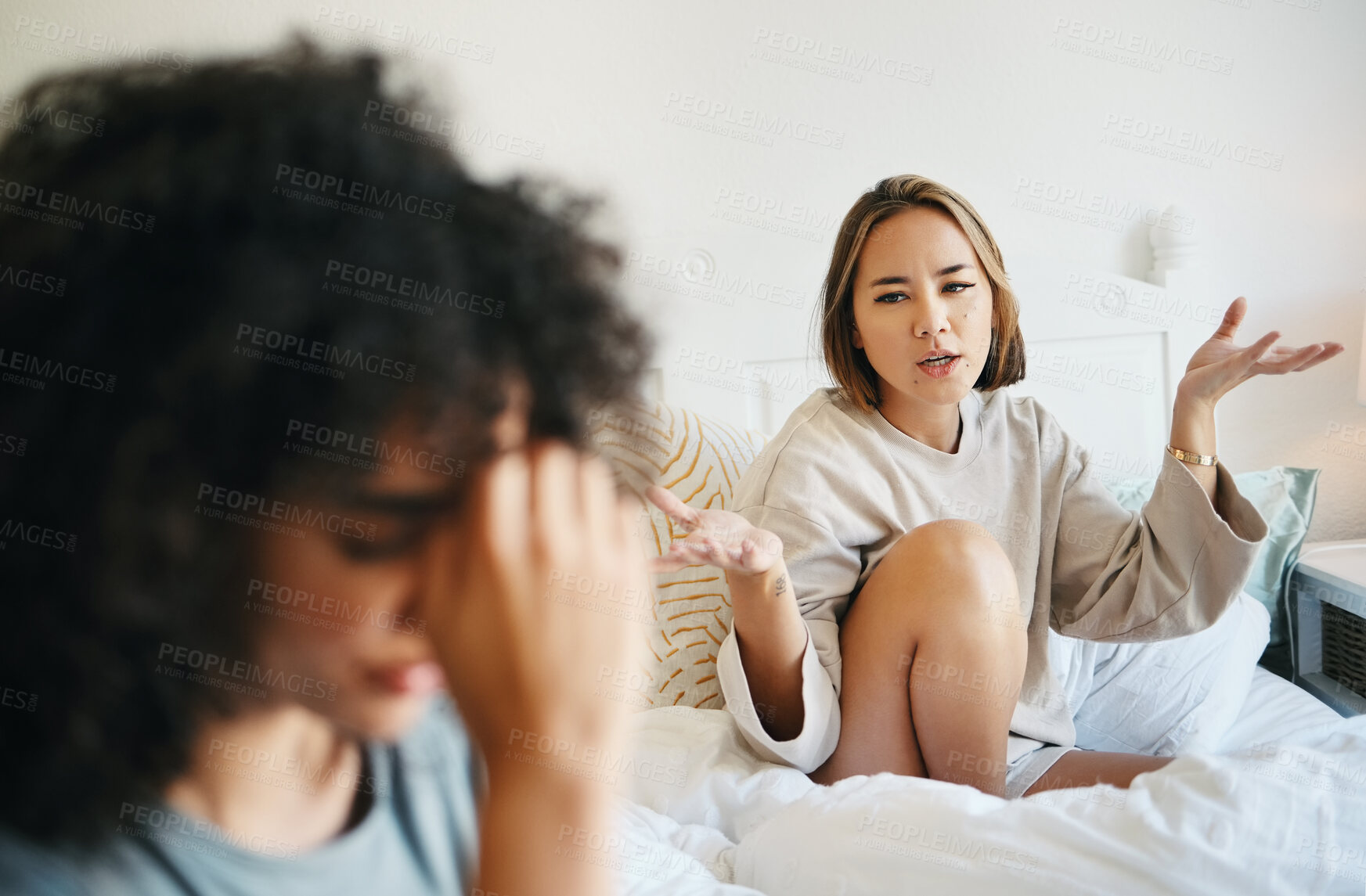 Buy stock photo Women, lgbt couple and arguing in bed, home and talking with frustration, stress and headache. Communication, choice and sad for relationship, problems and fight for love, conversation and conflict