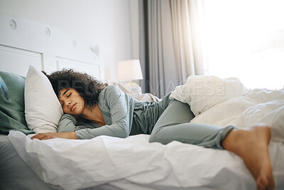 Buy stock photo Woman, peace and sleeping on bed in bedroom with fatigue and burnout, dream and relax for stress relief. Exhausted, person and girl in house or home lying on pillow in apartment for wellness and calm