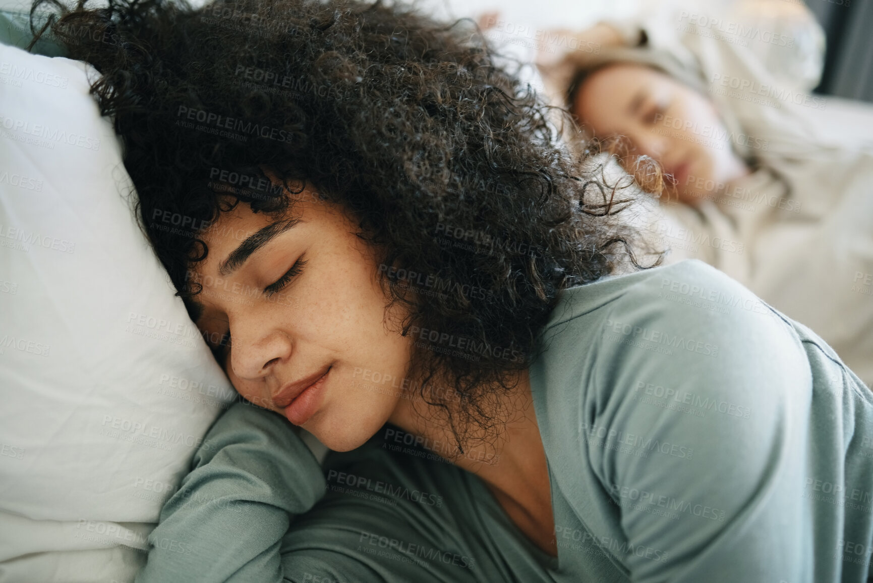 Buy stock photo Lgbtq, relax and women sleeping on bed in bedroom with fatigue and love, dream or tired. Exhausted, people and lesbian couple together in home lying on pillow in apartment for wellness and calm
