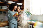 Lgbt couple, coffee and kitchen with smile for connection, romantic or relationship happiness. Lesbian woman partner, apartment and freedom hug for equality conversation, together or diversity pride