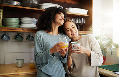 Buy stock photo Coffee, orange juice and happy lesbian couple in home, bonding and communication. Drink tea, gay women and girls smile in the morning at breakfast together in interracial relationship, care and LGBT