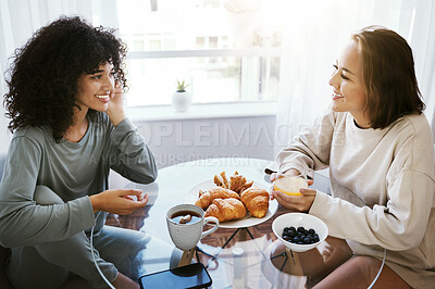 Buy stock photo Orange juice, breakfast and happy lesbian couple at table in home bonding. Drink, food and croissant of gay women in the morning together for nutrition, eating and healthy interracial relationship