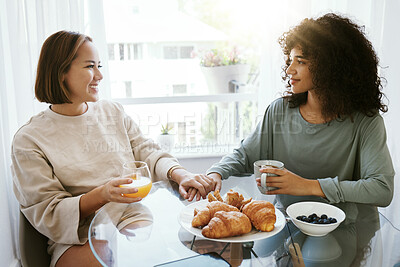 Buy stock photo Orange juice, coffee and happy lesbian couple holding hands in home at table bonding together. Smile, support and gay women in love in the morning at breakfast, LGBT care and interracial relationship
