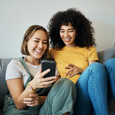 Buy stock photo Friends, relax on sofa with smartphone and chat online with communication, funny meme and reading text message. Women with technology, mobile app and  typing on social media with connectivity at home