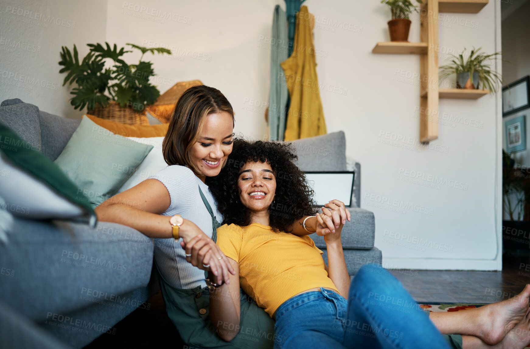 Buy stock photo Lesbian, couple and relax on couch for connection in home for support, communication or partnership. Happy woman, sofa or smile for identity or equality love in house for commitment, together or care