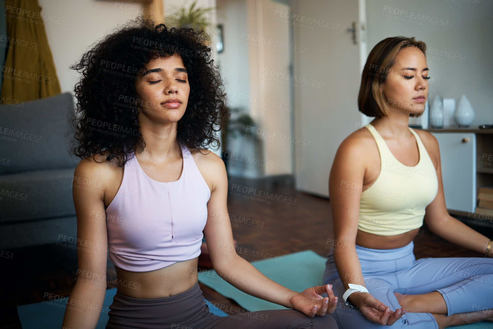 Buy stock photo Meditation, yoga and girl friends in the living room doing fitness in lotus position together. Calm, peace and young women doing pilates workout or exercise for breathing in the lounge at home