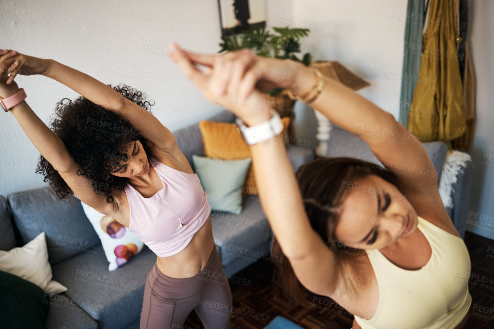 Buy stock photo Yoga, stretching and girl friends in the living room doing a warm up exercise together for wellness. Calm, peace and young women doing pilates workout for breathing in the lounge at modern apartment.