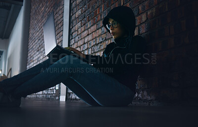 Buy stock photo Hacker, woman in dark room with laptop and information technology, phishing and cyber crime with database or server. Cybersecurity, programming and criminal with pc, ransomware and firewall breach