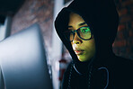 Hacker, woman in dark room with laptop and coding, phishing and cyber crime with IT database or server. Cybersecurity, programming and criminal with pc in basement, ransomware and hacking firewall