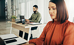 Small business, couple in home office and working together at planning startup strategy online. Coworking, man and woman at desk with laptop, networking email and internet research at digital agency.