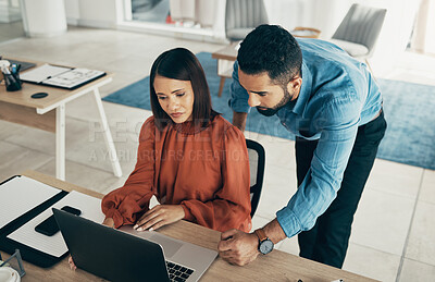 Buy stock photo Employee, manager and office with laptop with creative director, above and feedback on project. Diversity, man and woman for consulting by technology, performance review and concern with job progress