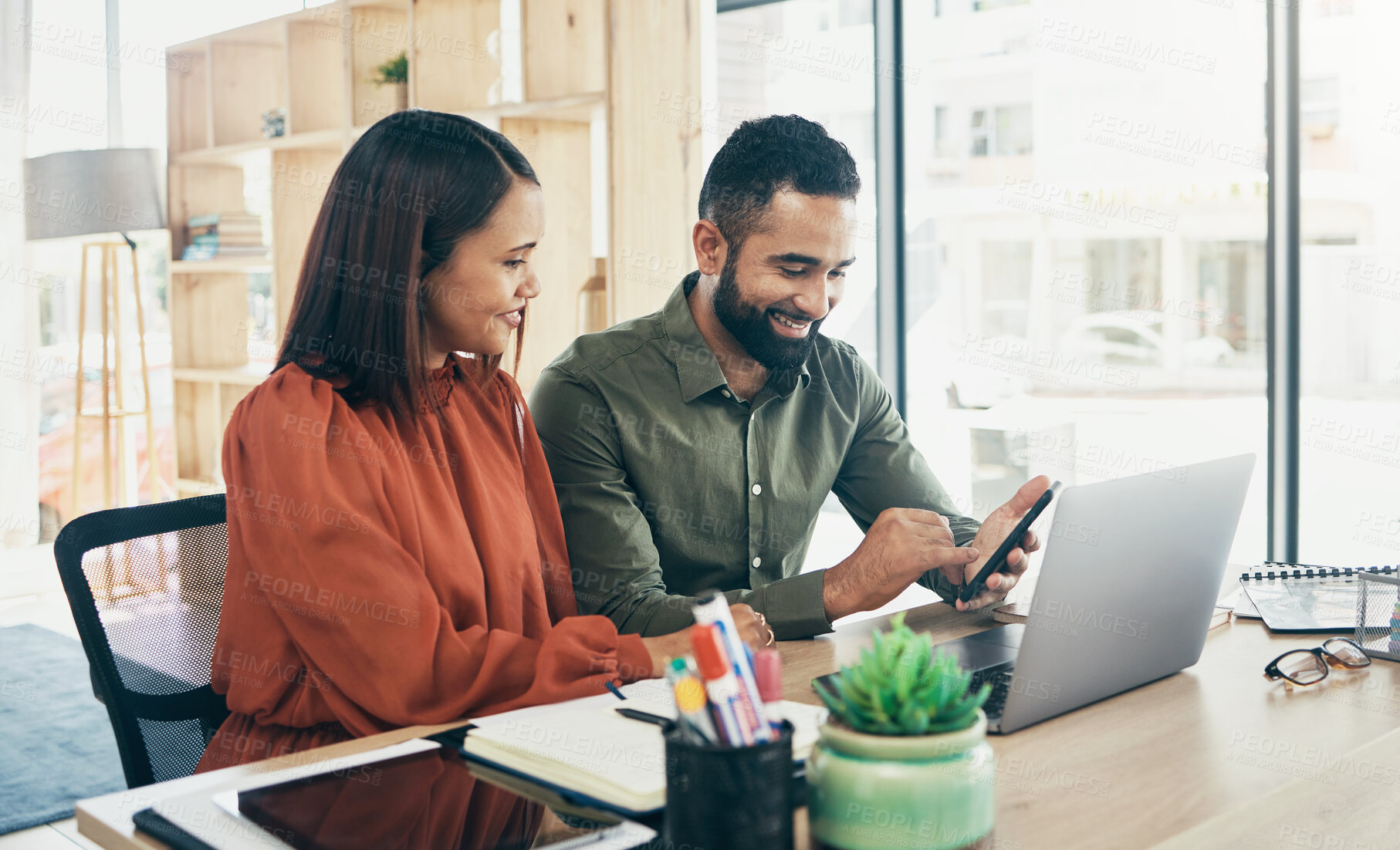 Buy stock photo Man, women and work in office with cellphone with smile, social media and communication. Diversity, teamwork and friends with technology for review, chat group and manager feedback on project success