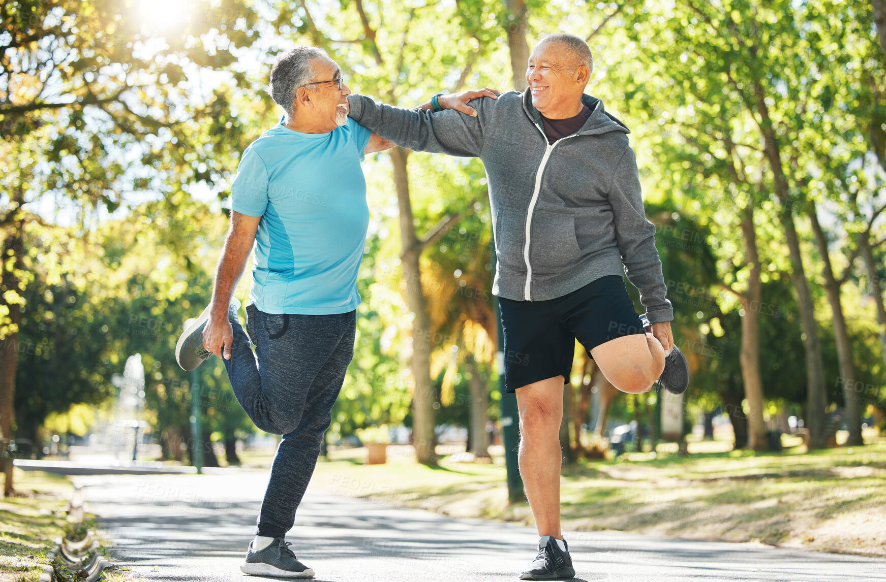 Buy stock photo Senior man, friends and stretching in nature for running, exercise or outdoor training together at park. Mature people in body warm up, leg stretch or preparation for cardio workout or team fitness