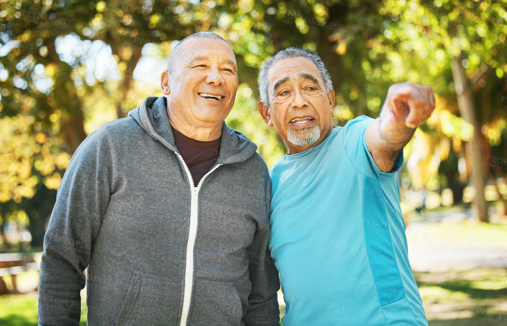 Buy stock photo Outdoor, senior men and pointing with fitness, exercise and health with direction, workout and wellness. Old people, friends and guys in a park, training and pensioner with nature and motivation