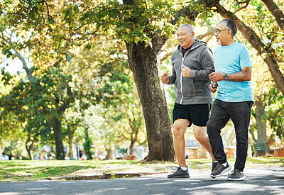 Buy stock photo Elderly, men and running for fitness in road of city for wellness, exercise or workout outdoor with smile. Senior, people and training together in nature or park for health, adventure and happiness