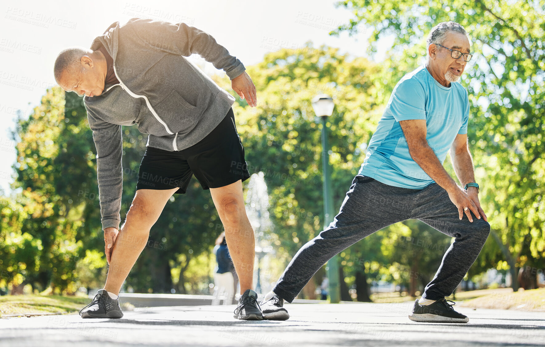 Buy stock photo Senior man, friends and stretching for running, exercise or outdoor training together at park. Mature people in body warm up, leg stretch or preparation for cardio workout or team fitness in nature