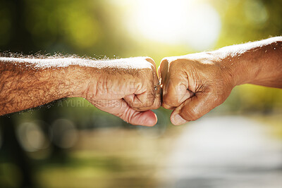 Buy stock photo Support, nature and a fist bump for fitness motivation, solidarity or collaboration in exercise. Connection, teamwork and people with hands or a gesture for training success or target in a park