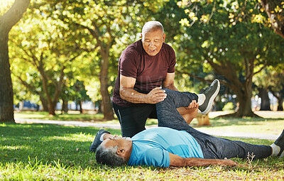 Buy stock photo Stretching, park and men for fitness in retirement, support or help with exercise. Physiotherapy, training and senior coach with elderly athlete for warm up on the grass for sports or rehabilitation