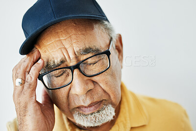 Buy stock photo Headache, pain and face of senior man with fatigue, burnout or problem with health on white background. Stress, migraine and frustrated elderly person with hand on head in retirement with anxiety