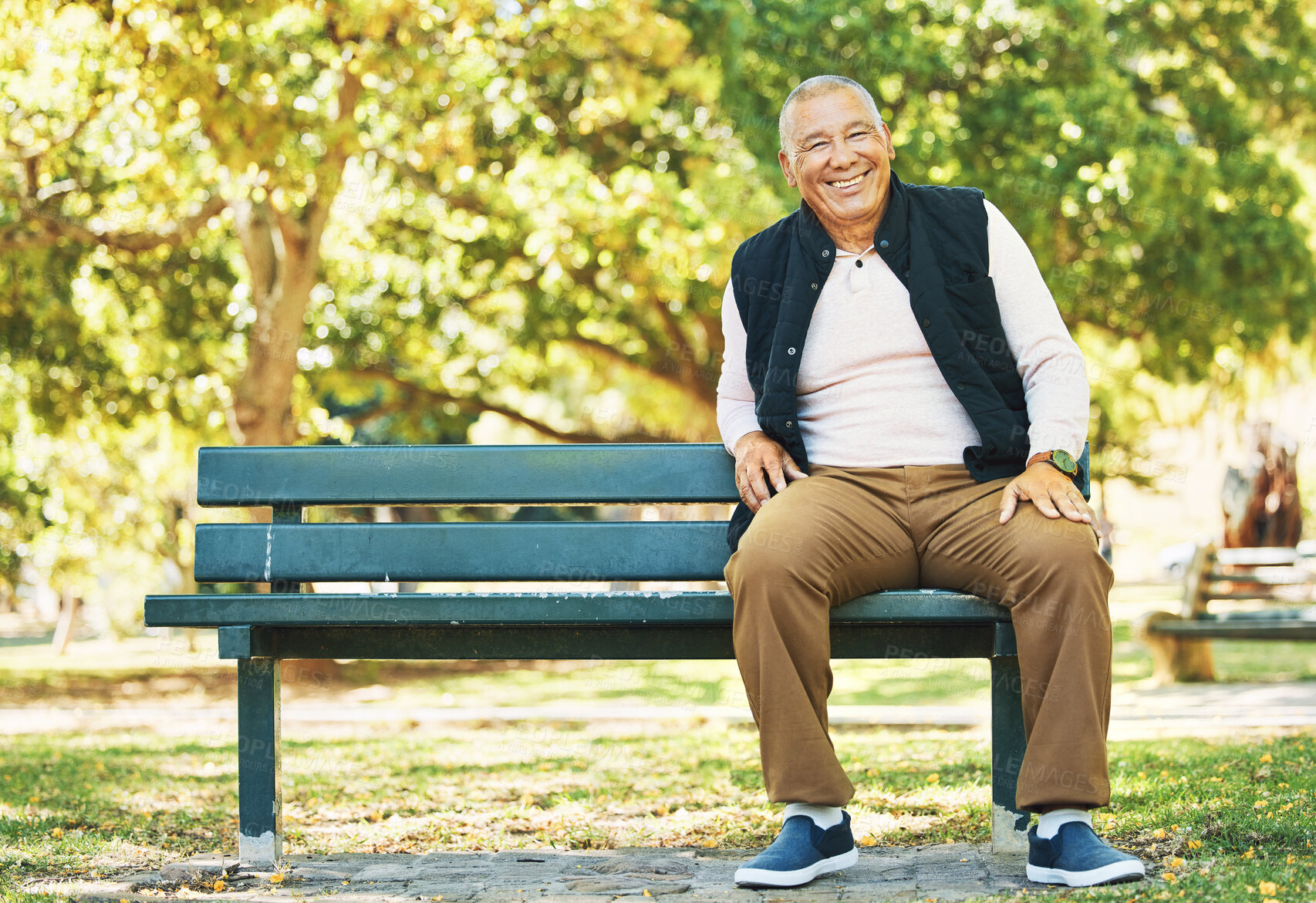 Buy stock photo Park, happy and portrait of old man on bench outdoor for fresh air, wellness and relaxing in retirement. Smile, peace and elderly person sitting in nature for calm, freedom and and enjoy weekend