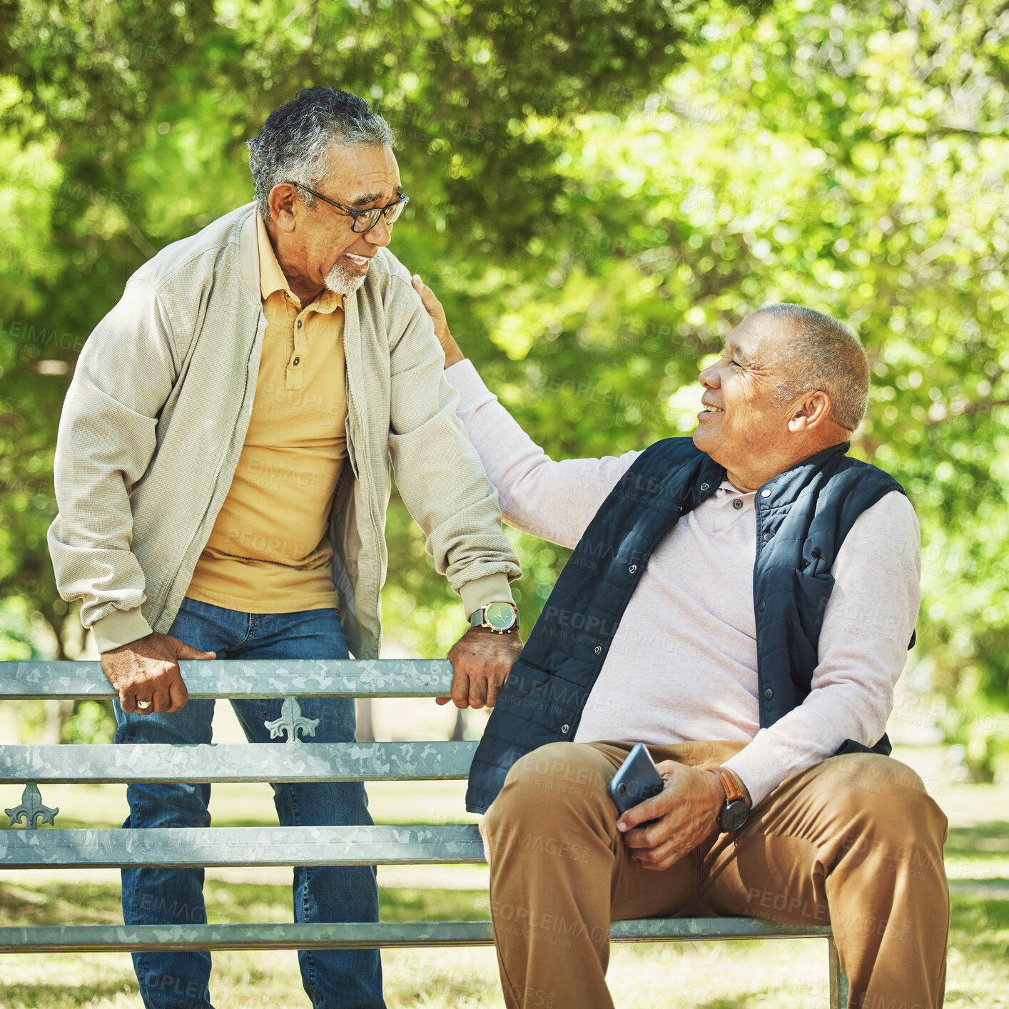 Buy stock photo Senior friends, men and support on park bench, talk and bonding outdoor to relax. Happy elderly people sitting together in garden, comfort in communication and conversation in nature for retirement