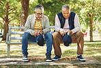 Elderly men, park and praying with faith, nature and communication to god for spiritual insight. Diversity, closeup and senior person with religion with hats down, respect and gratitude in retirement