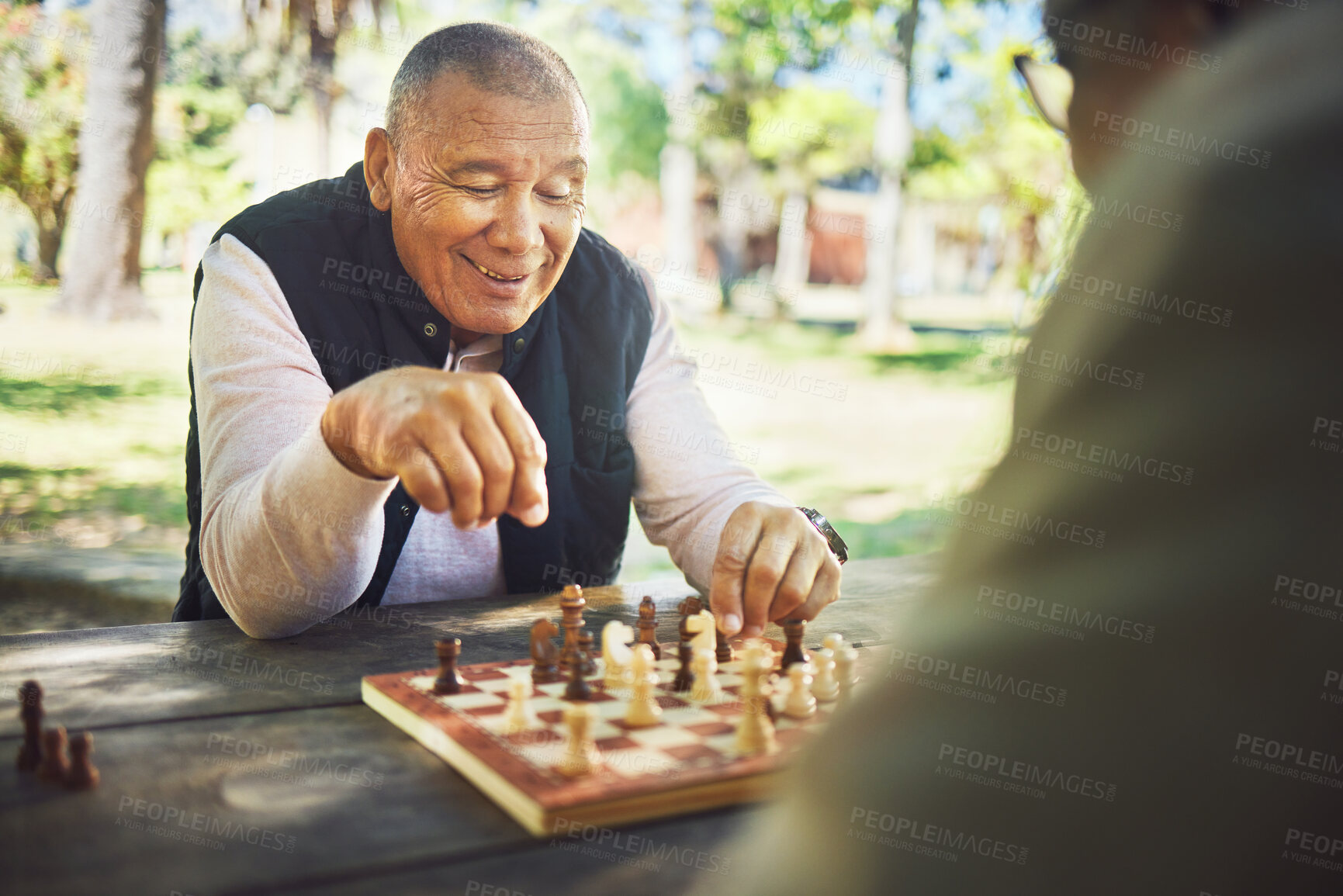 Buy stock photo Happy, table and people in nature for chess, strategy and relax with a sport together. Smile, thinking and elderly or senior friends in retirement with games in a park on a board for competition