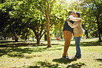 Mature, men and hug on retirement in park for banner with copy space. Elderly, people or friends in nature, trees or garden for nursing home, vacation or holiday for relaxing, rehabilitation or fun