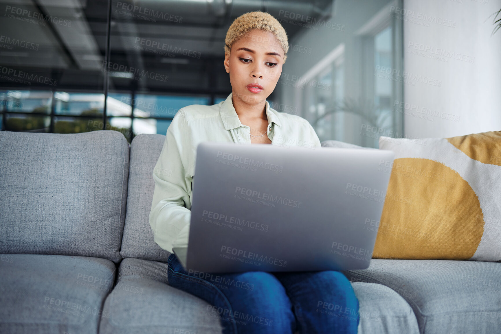 Buy stock photo Businesswoman, alone and laptop for communication at home for financial planning, reports or email. Young, female and entrepreneur for remote work with feedback on technology, internet and web