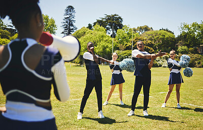 Buy stock photo Cheerleading team, coach and megaphone for practice, stretching and sports field for dancing, cheering and support. Training, warm up and outdoor for exercise together, competition and energy