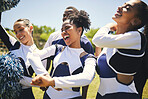 Cheerleaders, grass field and champion with celebration, smile and winner with happiness, motivation and teamwork. Women, men and group cheering, outdoor or chanting with workout, support and excited