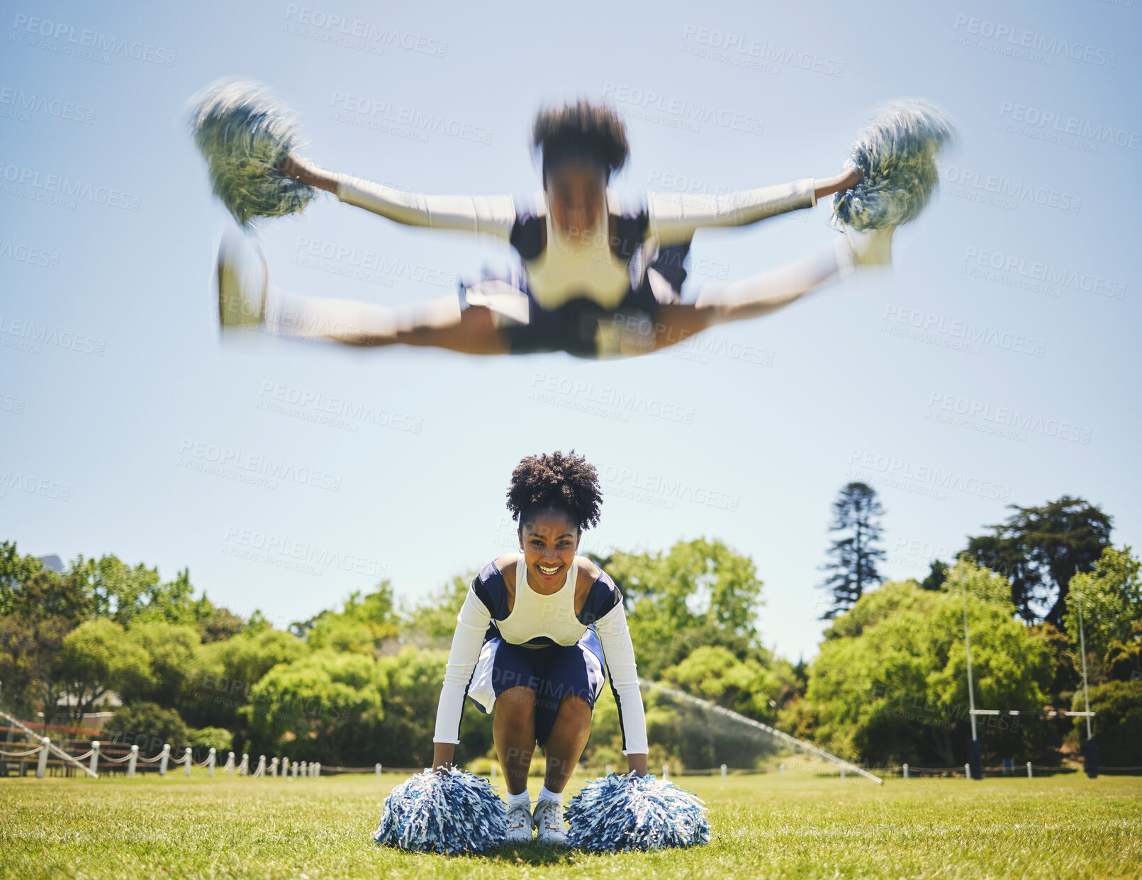 Buy stock photo Portrait, cheerleader or girl in jump motion on field for fitness training in outdoor workout for performance. Smile, blur or happy sports woman on grass for motivation, inspiration or support