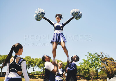 Teamwork, motivation or cheerleader in air with people outdoor in training routine or sports event. Jump, sky or girl by a happy cheer squad group on a field together for support, exercise or fitness