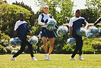 Portrait, motivation and a cheerleader team of young people outdoor for a training routine or sports event. Smile, fitness and diversity with a happy cheer squad group on a field together for support