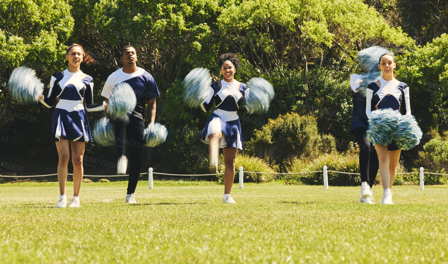 Buy stock photo Motion blur, motivation and a cheerleader group of young people outdoor for a training routine or sports event. Smile, teamwork and diversity with a happy cheer squad on a field together for support