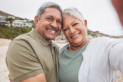 Buy stock photo Senior, couple and selfie on beach for travel, vacation or retirement in nature with happiness and profile picture. Elderly, man or woman with portrait smile for holiday or adventure update by ocean 