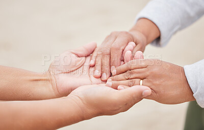 Buy stock photo Hand holding, couple and marriage on beach, ring and love in commitment ceremony, anniversary or celebration. Wedding, man or woman on holiday, bonding together or  closeup for support, care or peace