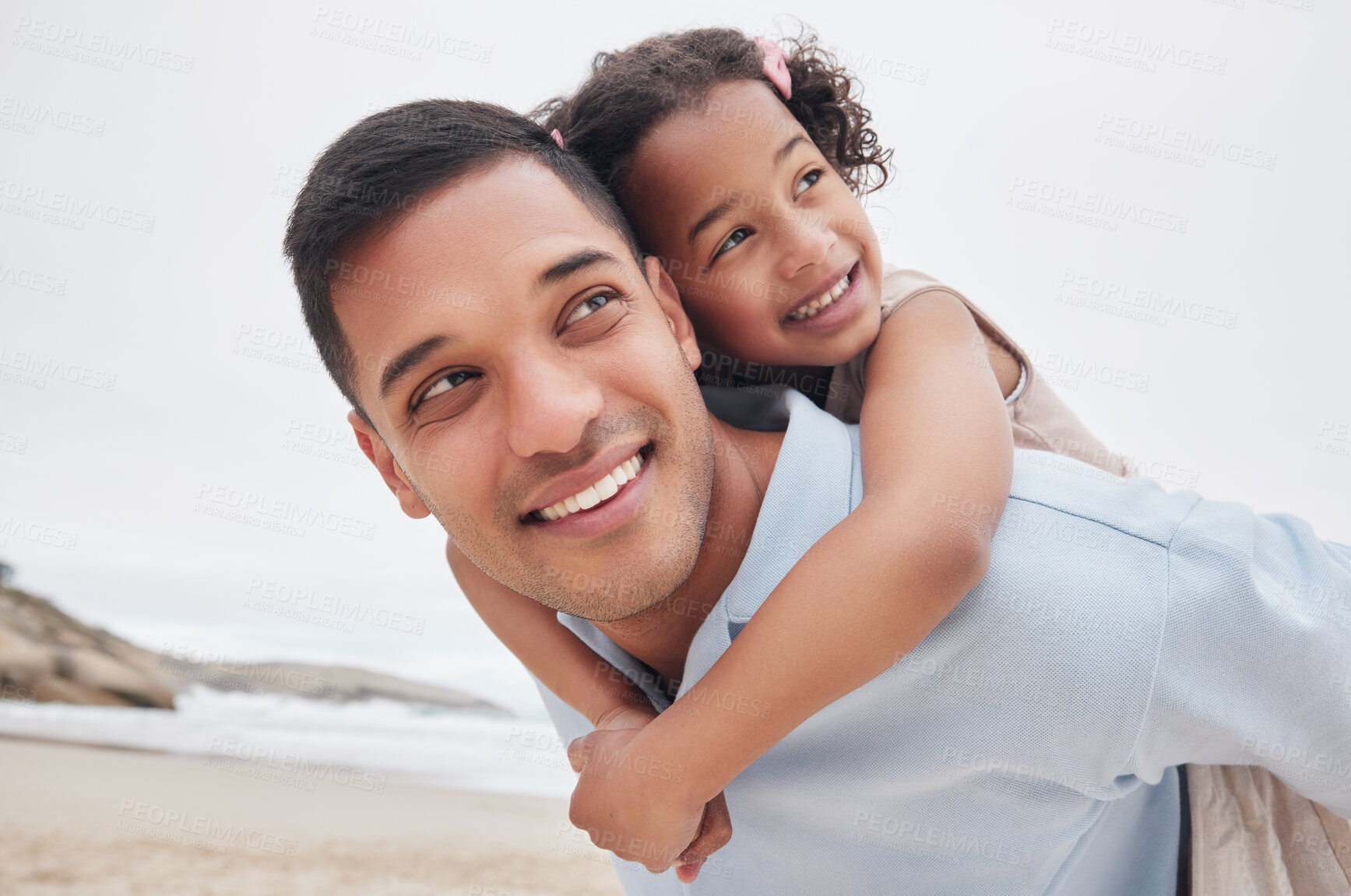Buy stock photo Beach, piggy back or happy dad with child in nature to enjoy a family holiday vacation in New Zealand. Travel, hug or proud father at sea or ocean with smile, kid or girl to relax or bond together
