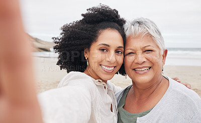 Buy stock photo Family, women and selfie on beach for travel, vacation or adventure in nature with happiness and profile picture. Portrait, mother and daughter together with smile for holiday update by ocean or sea